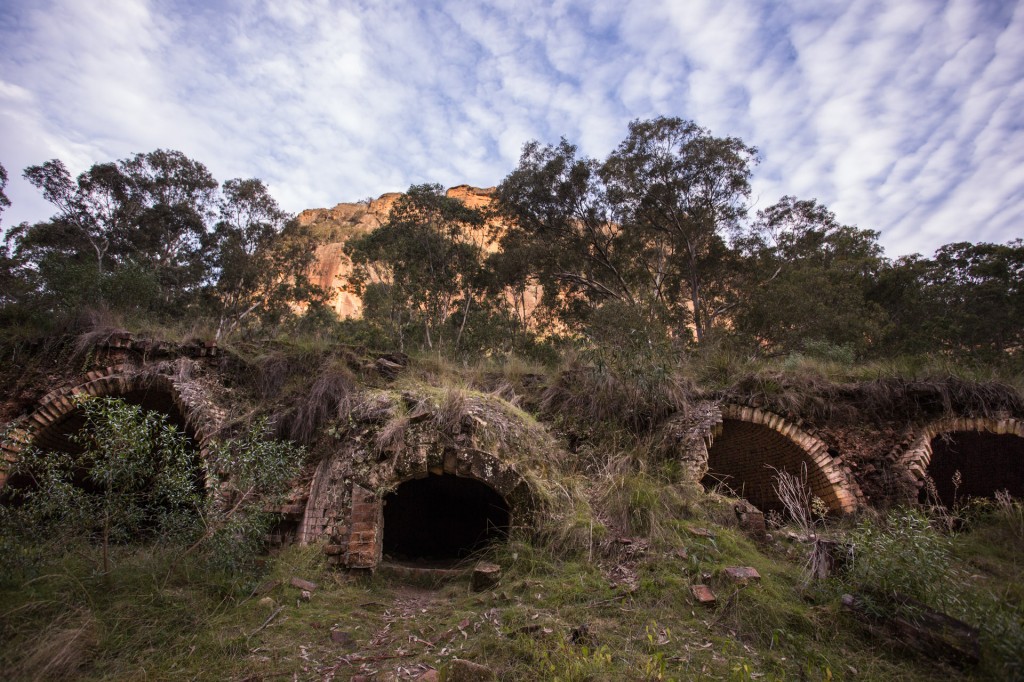 The ever present cliffs towering above the Newnes industrial ruins