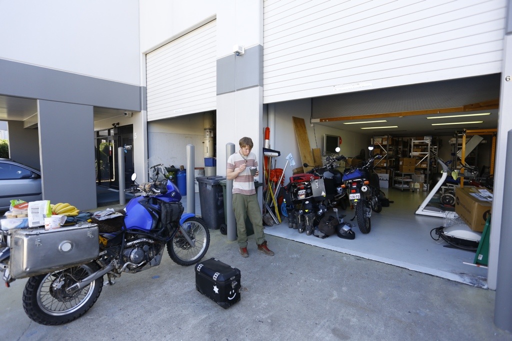 Raman outside Sleepy John's workshop. We both admired the we set up Suzuki DR650 and the BMW1200GS